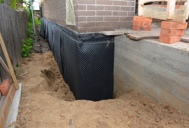 Happy homeowners after waterproofing job in Frankenmuth
